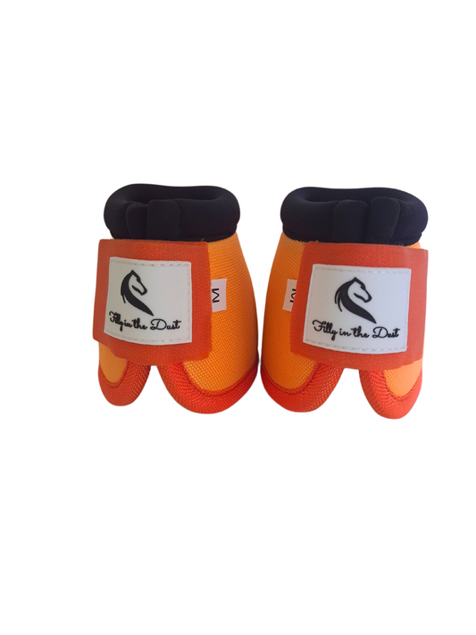 Pair of orange protective bell boots with a brand label on a white background
