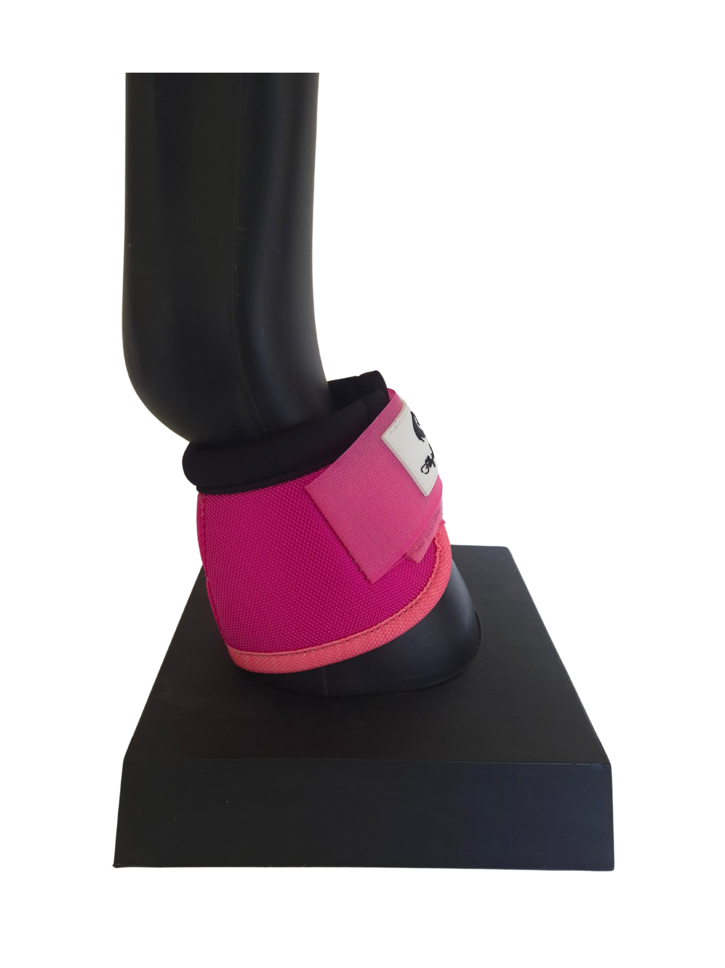 Pink protective bell boot on a black mannequin leg against a white background