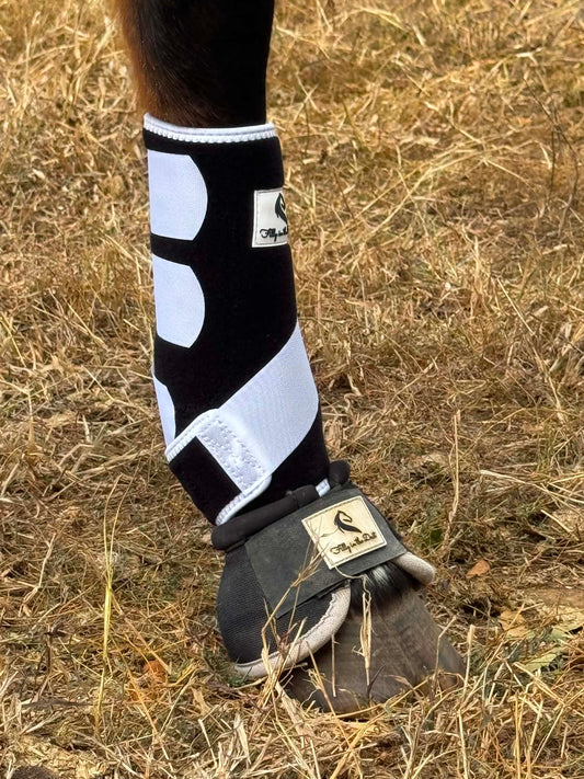 Black and White Sling Boots