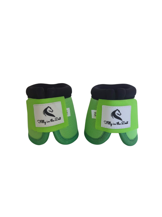 Pair of green protective bell boots with  on a white background